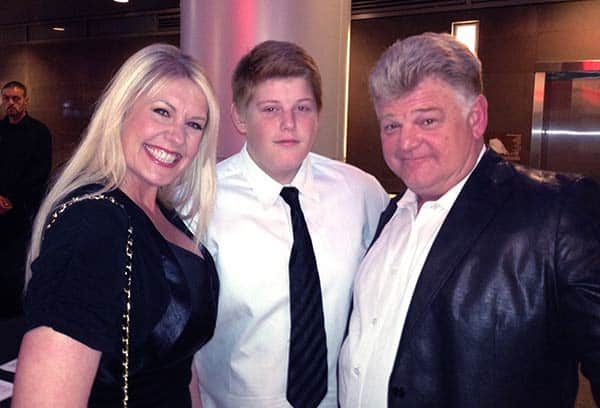 Image of Dan Dotson with his wife Laura Dotson and with his son Garrett