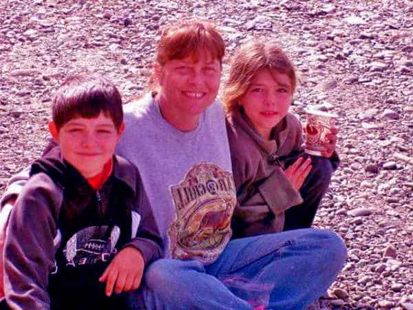 Image of Sue Aikens with her grandchildren