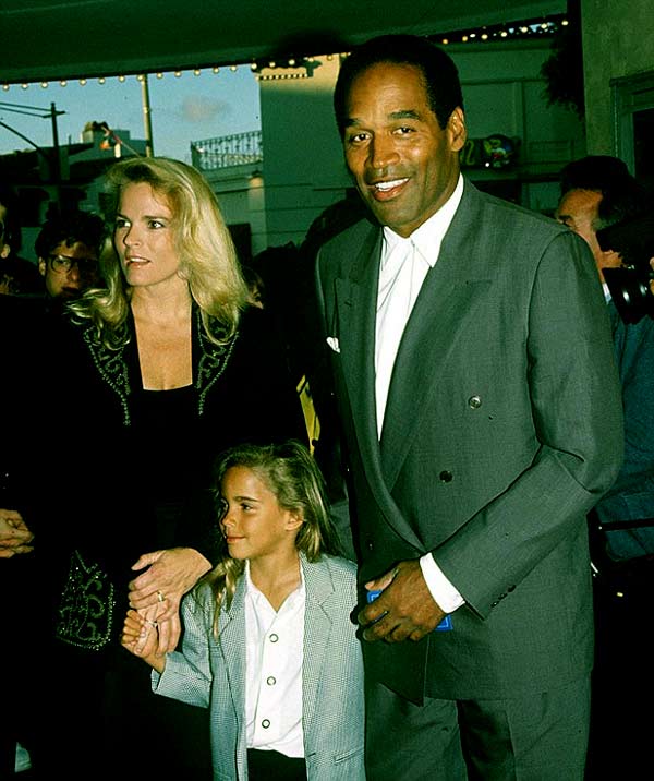 Image of Caption: Sydney Simpson with her father O.J. Simpson and mother Nicole Brown