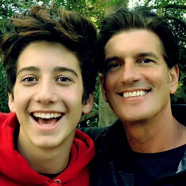 Image of Caption: Jeffrey Brezovar with his son Milo Manheim